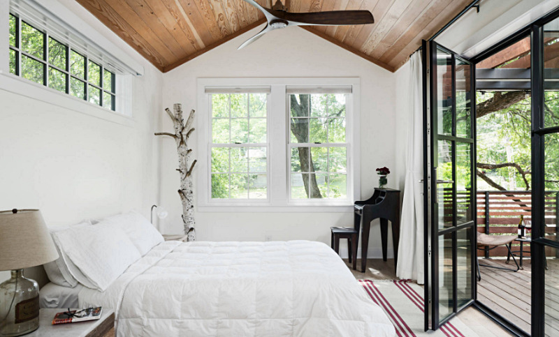 White and Black Bedroom with Vaulted Wood Ceiling