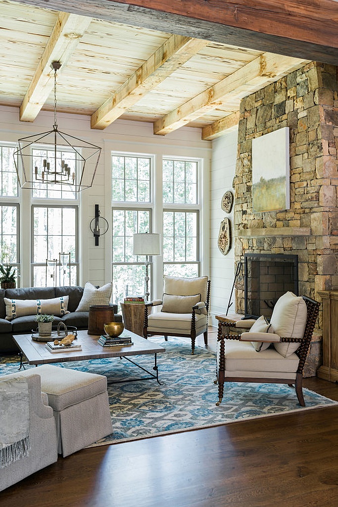 rustic living room with large windows