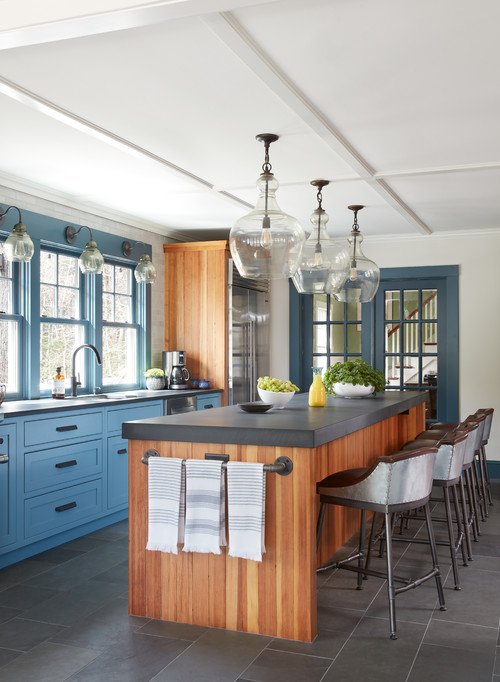 Modern Country Kitchen with Blue Cabinets and Black Counter Tops