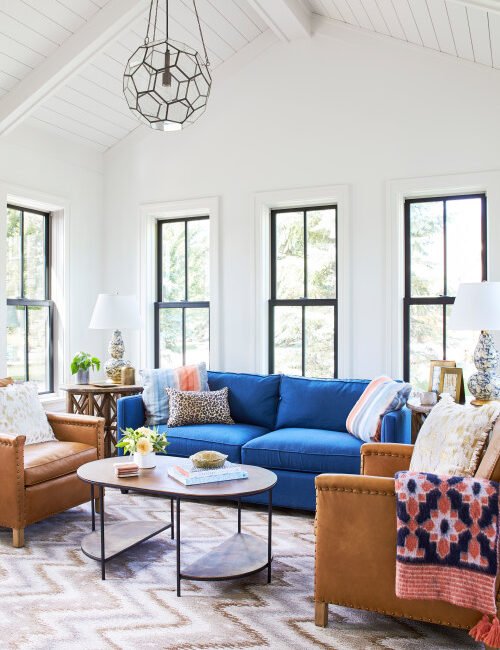 Blue and Tan Living Room in New Construction Farmhouse