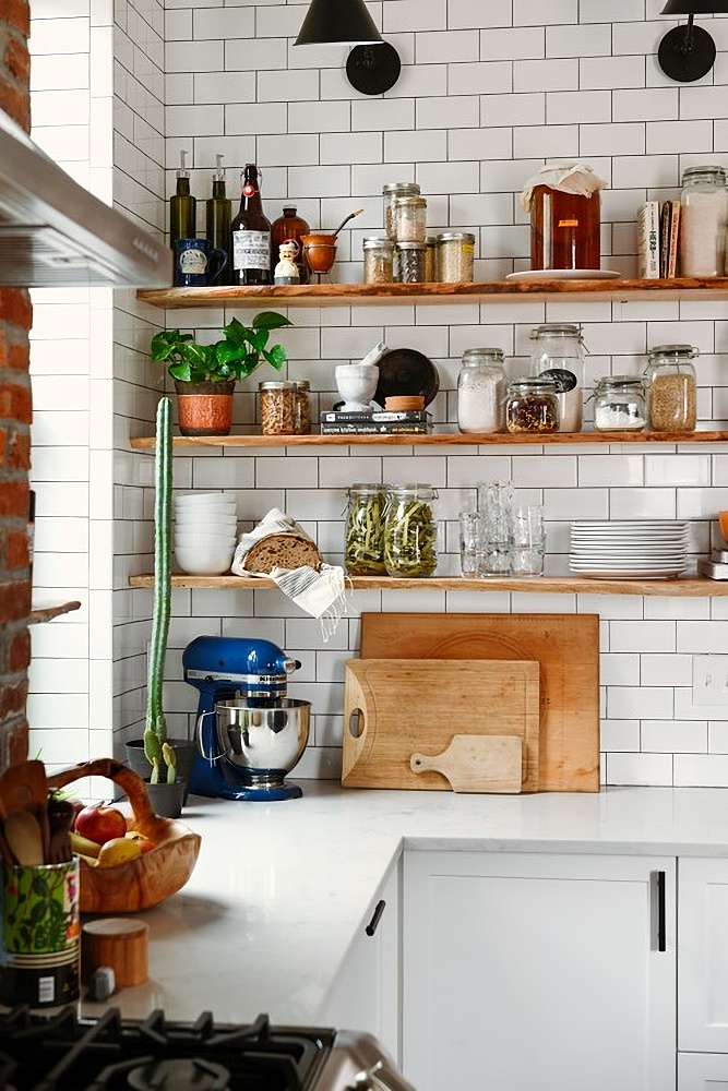 Open shelving with blue Kitchen Aid mixer