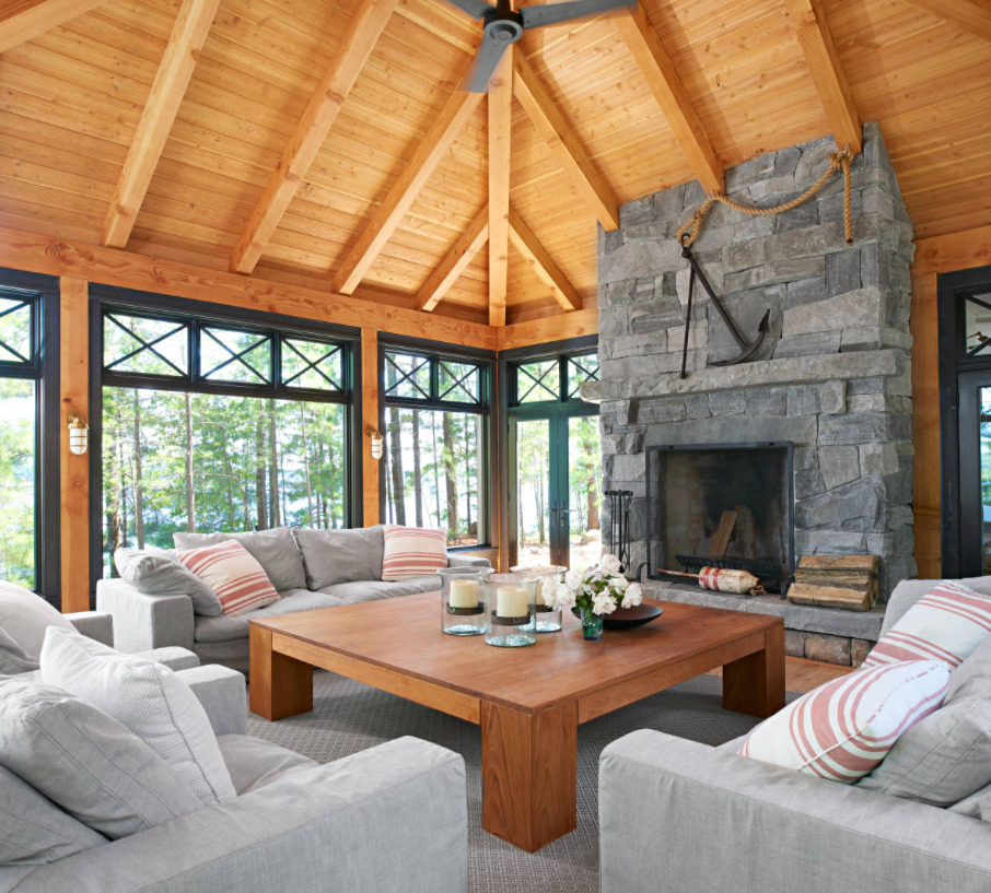 Four Season Porch with Wood Ceiling and Stone Fireplace