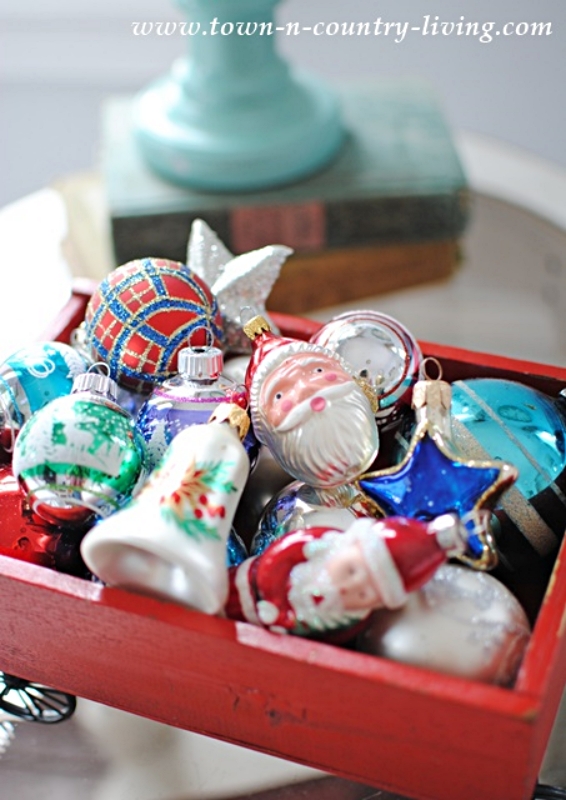 Red Wooden Wagon Filled with Vintage Christmas Decor Ornaments