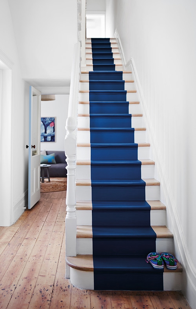 painted blue runner on stairway