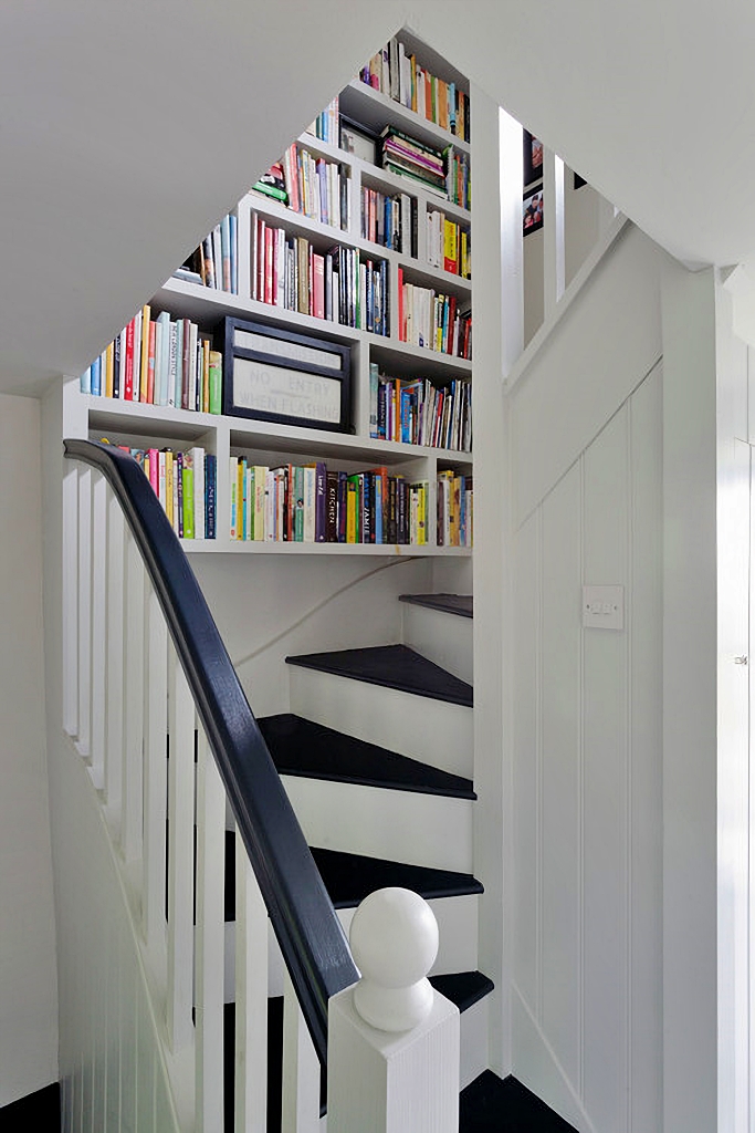 staircase with bookshelves