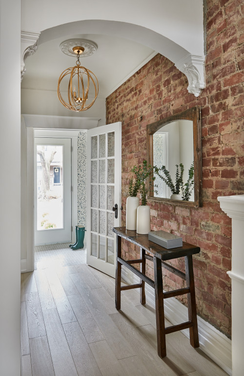Home Entryway with Brick Wall