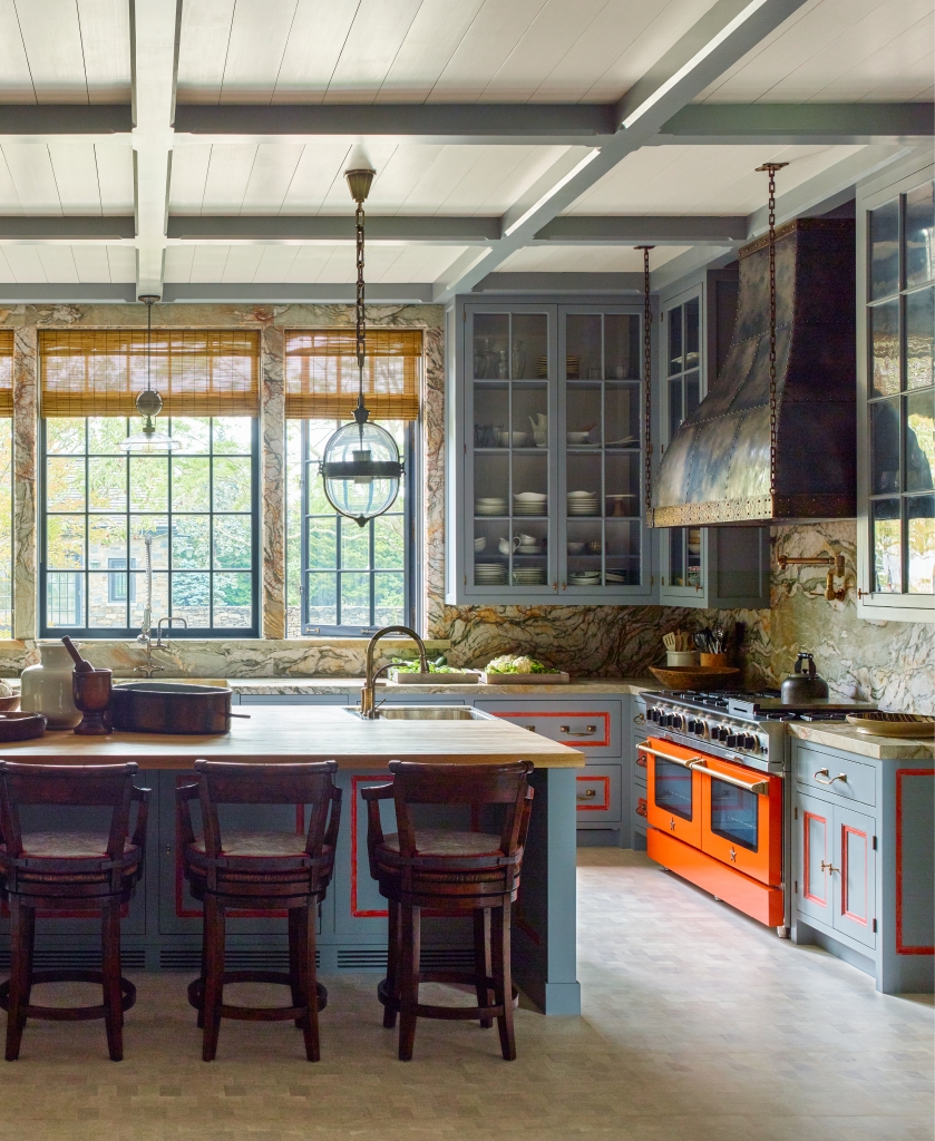 Dark blue-gray cabinets in a country estate kitchen