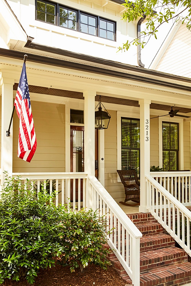 bungalow front porch with us flag