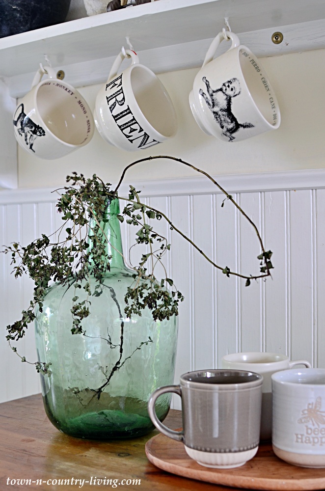French olive jar in the kitchen with coffee mugs