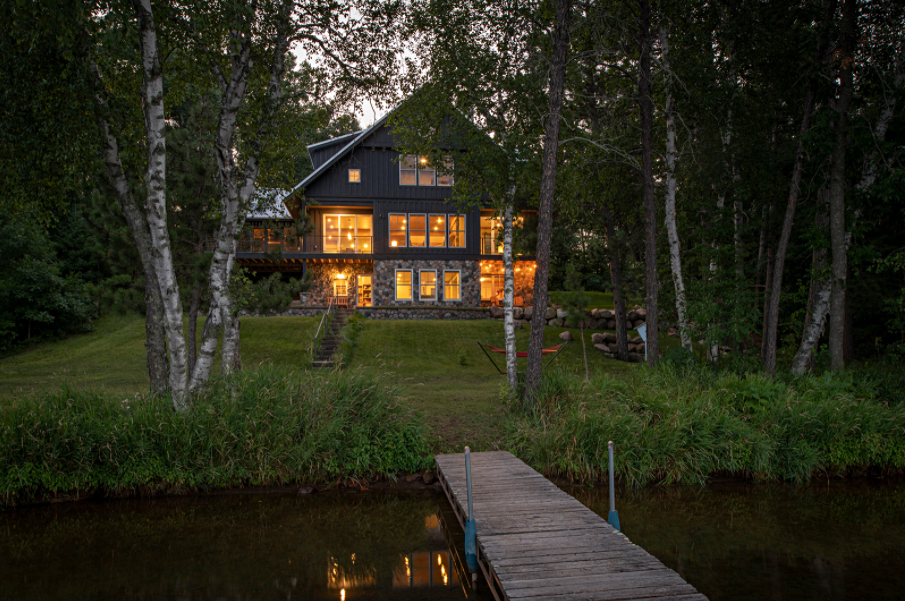 Modern lakefront cabin in the woods