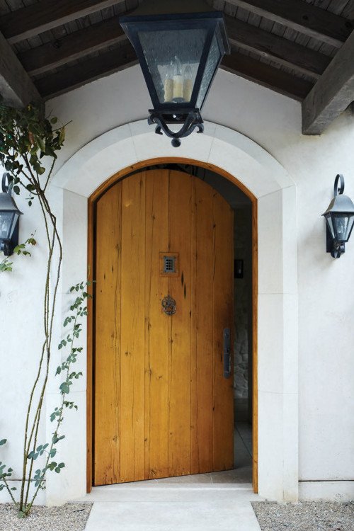 arched wooden front door