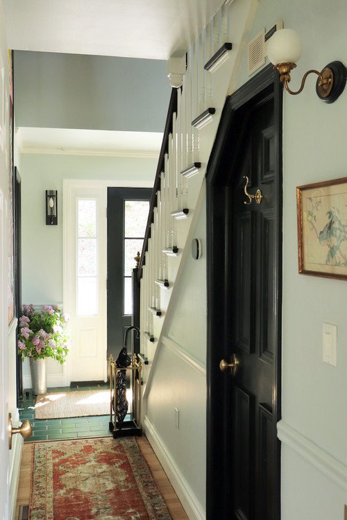 Black and white trim in traditional home entryway