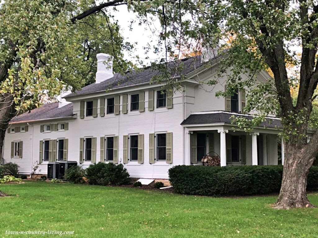 Large White Colonial Home on Rock River