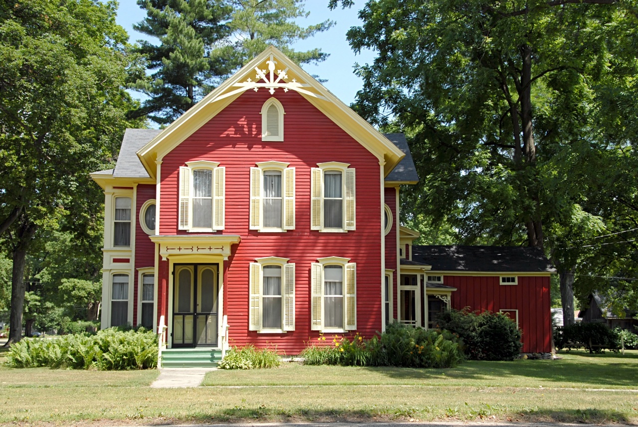 Red Siding With Stone Facade