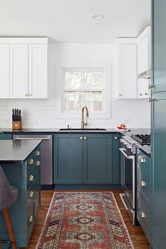 Bungalow style kitchen with blue-green and white cabinets