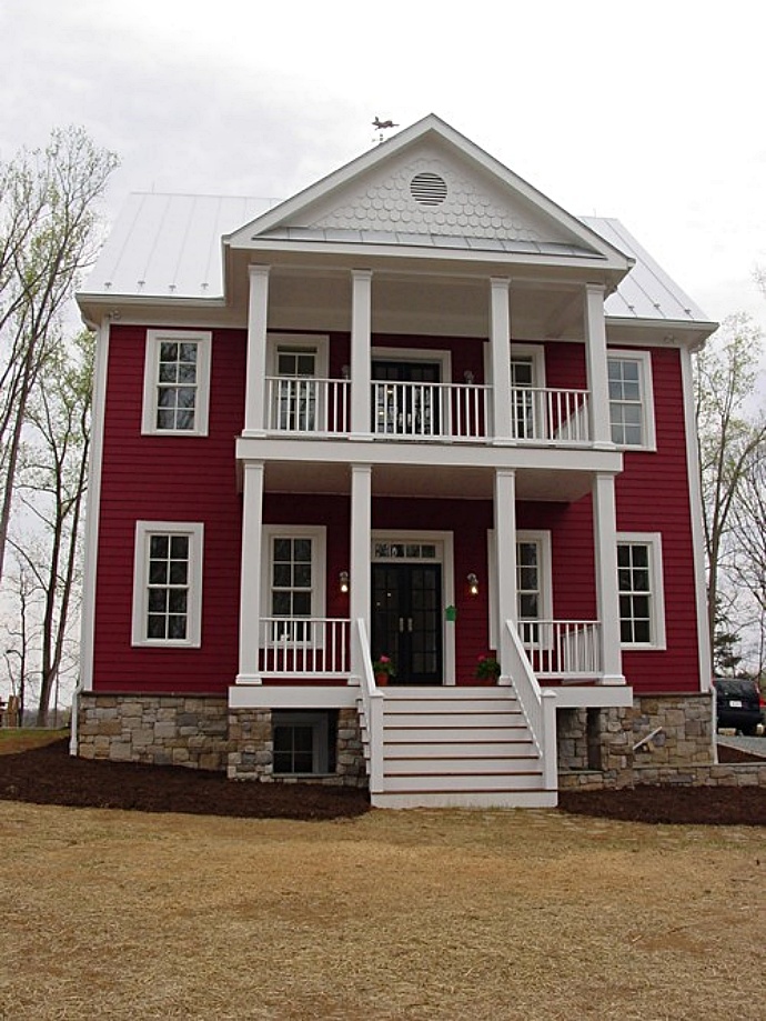 Two-story colonial with double decker porch