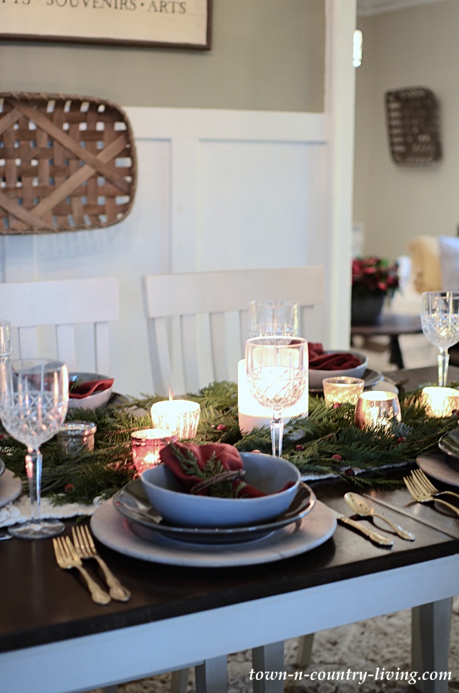 Christmas Table Setting in Dark and Light Gray with Evergreens