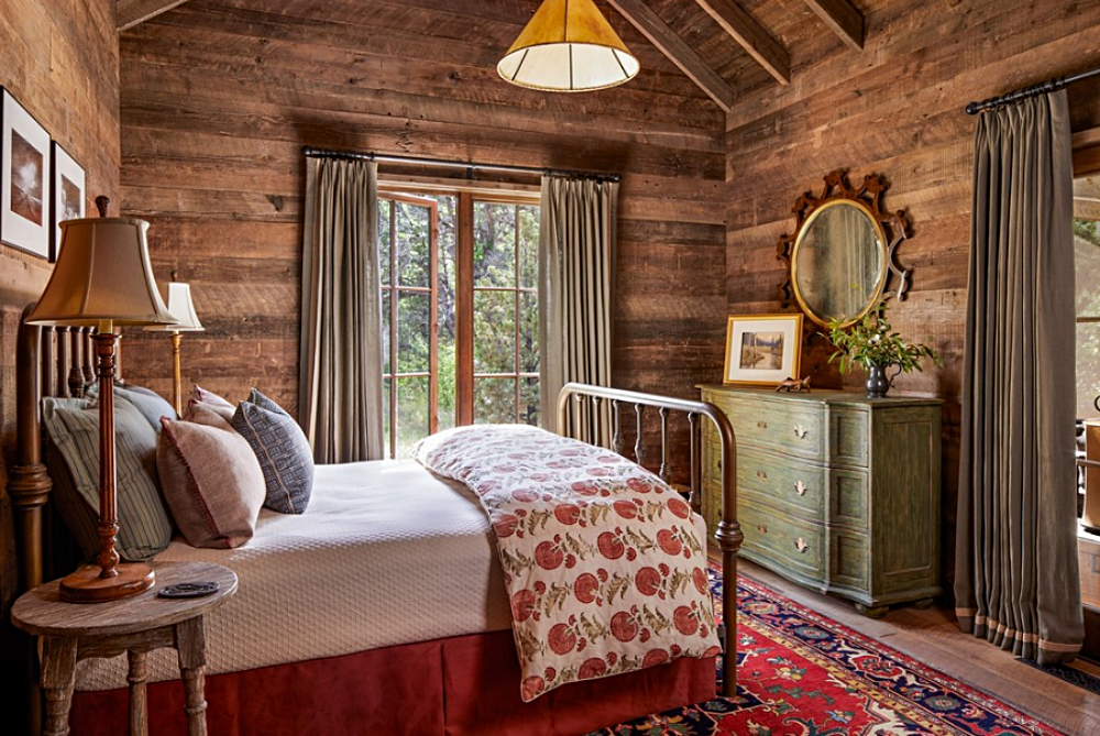Cabin bedroom with red bedding