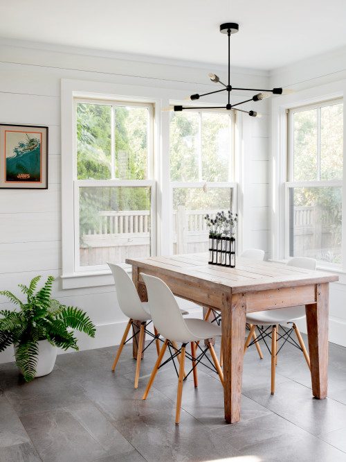 Beach style Cape Cod dining nook with white shiplap walls