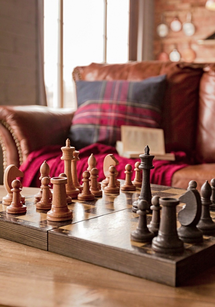 Chess game on a coffee table in a cabin