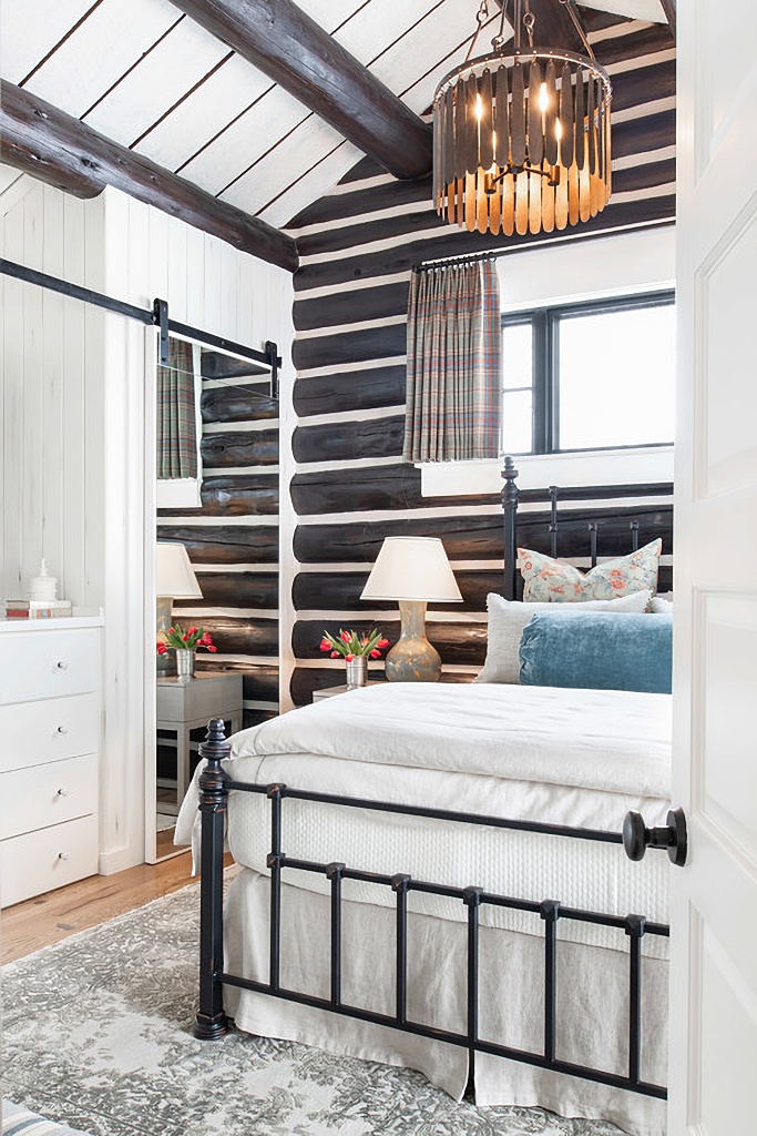 guest cabin bedroom with metal bed