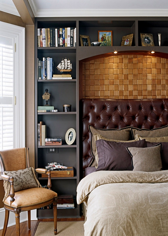 Leather upholstered bed with custom cabinetry