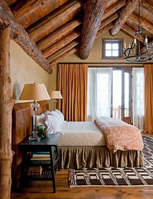 Rustic log ceiling in a mountain home bedroom