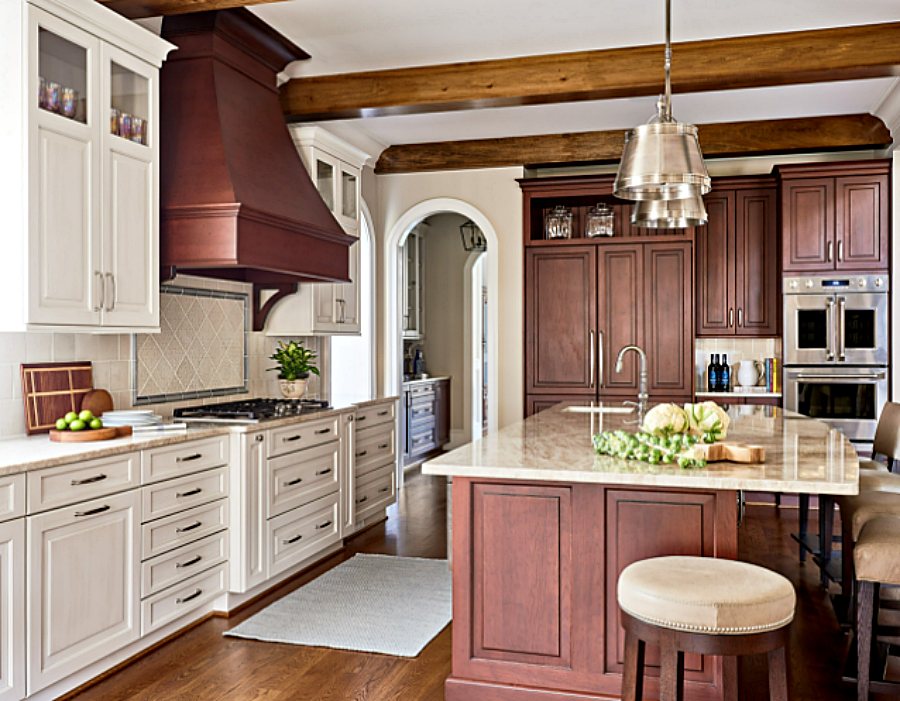 Traditional kitchen with wood and painted cabinets
