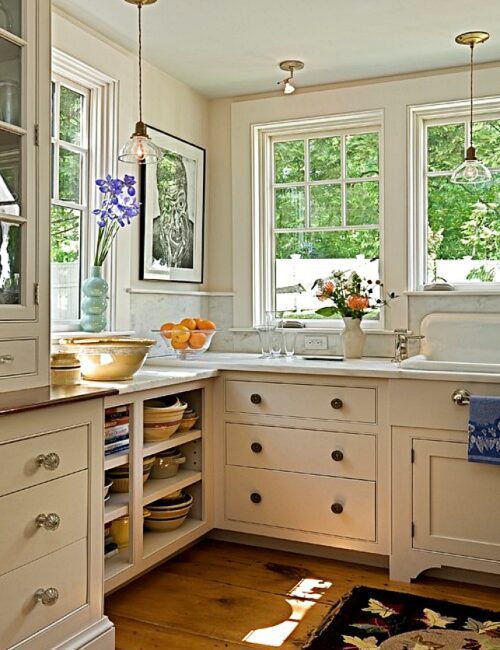 Charming older kitchen with wide plank wood floors