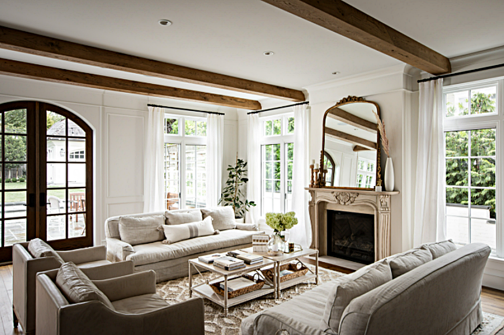 French country home - living room with wood accents