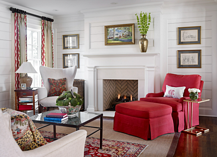 Traditional white living room with accents of red