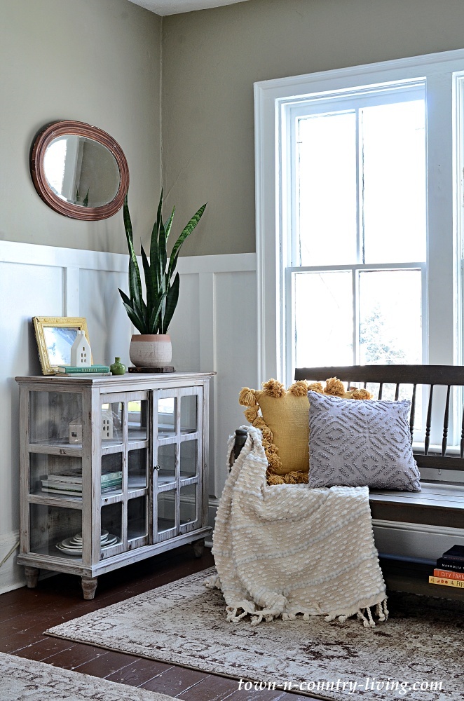 Scaled-back winter decorating in a farmhouse entryway