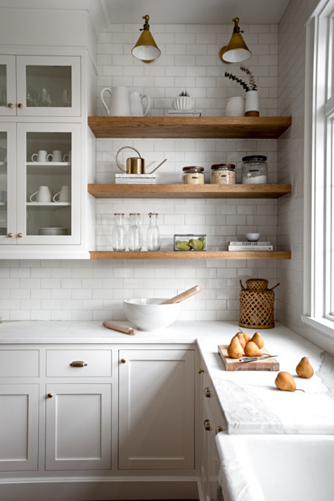 Wood shelves in a white kitchen