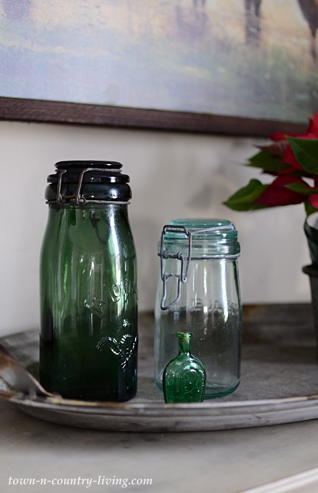 Green French canning jars on metal tray