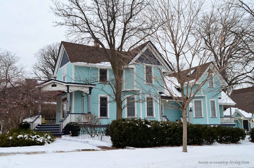 Bright blue Victorian home exterior