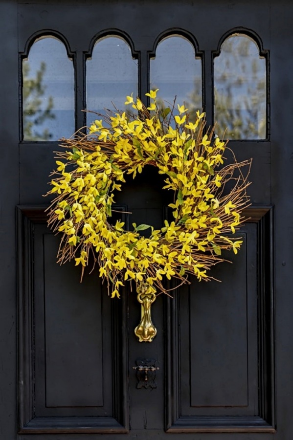 Spring Wreath Inspiration - forsythia wreath on black door