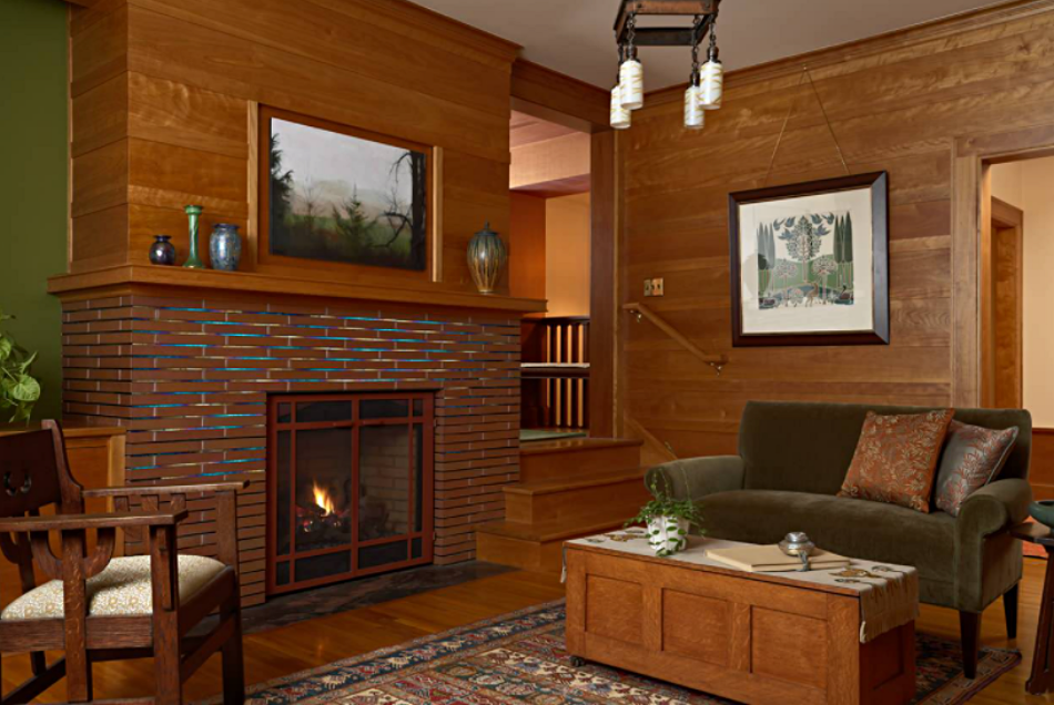 Brown paneled living room with fireplace