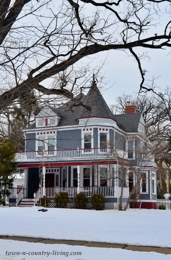 gray victorian home with turret