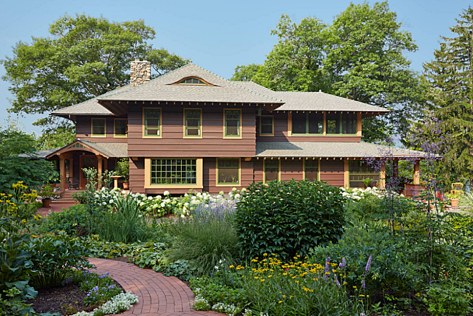 Large Brown Craftsman Home with Garden
