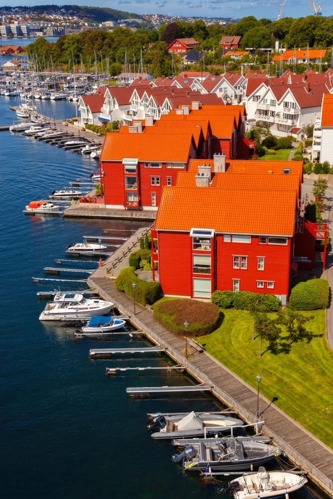 Stavanger marina with boats and red buildings