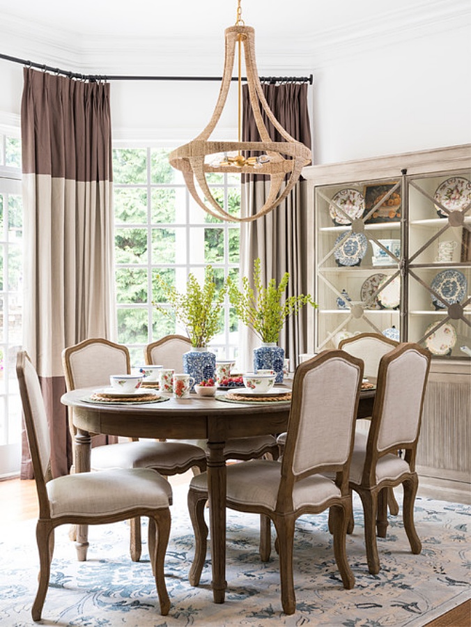 French country style dining nook with China cabinet