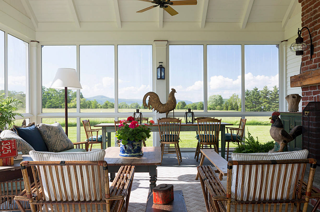 screened porch with dining table and furniture in the Berkshire mountains