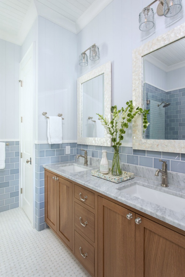 Traditional bathroom with pale blue subway tile