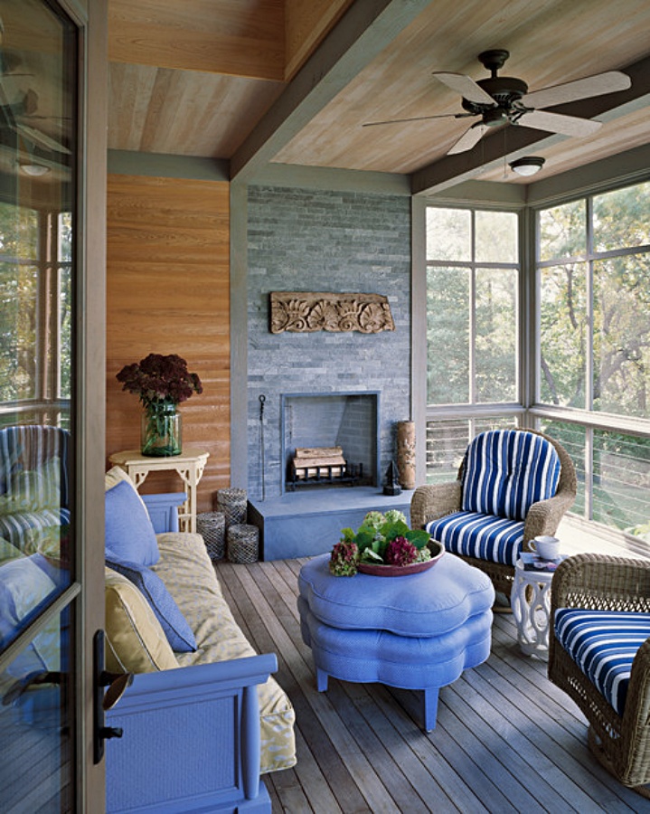 Beach style porch with fireplace