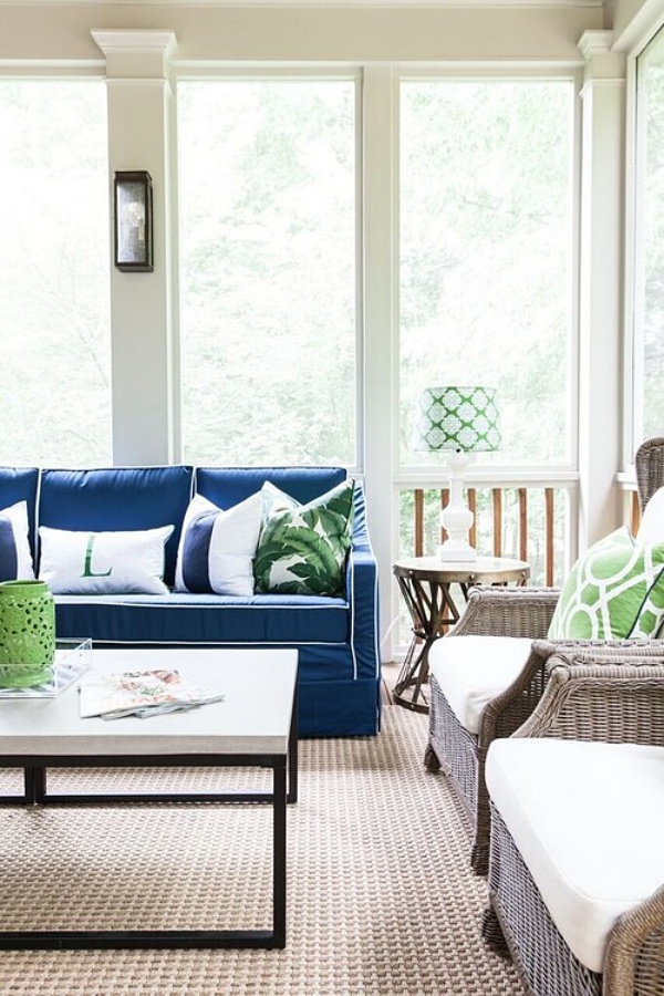 Blue and green furniture on three-season porch