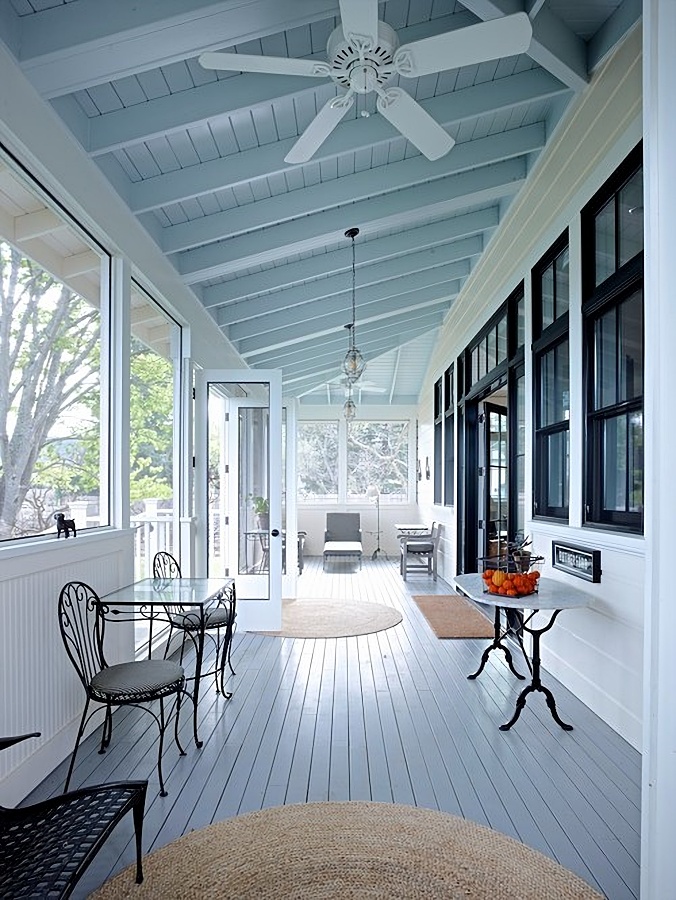 Vintage screened porch with haint blue ceiling