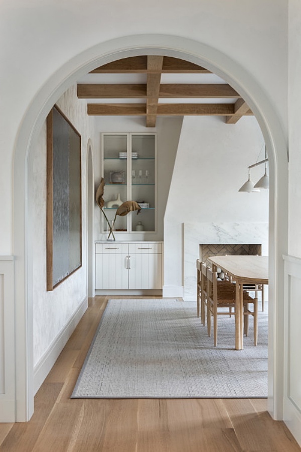 Scandinavian style dining room with pale wood floors
