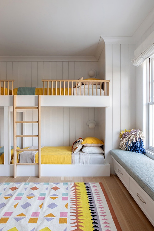 Kids bunk room with bright yellow