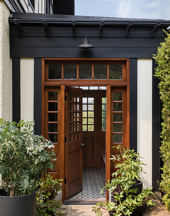 Wood door with sidelights and transom windows