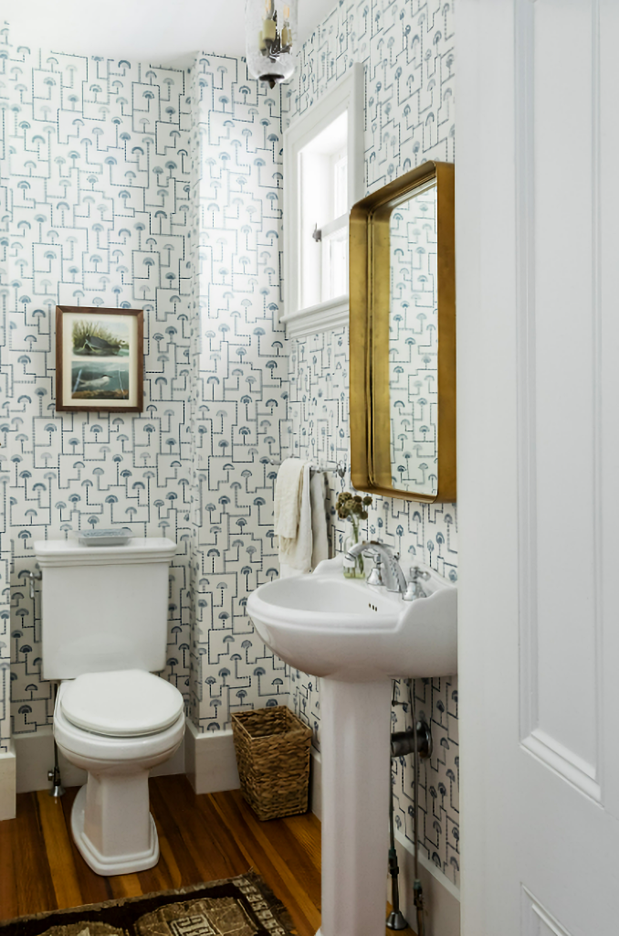 small bathroom with wallpaper